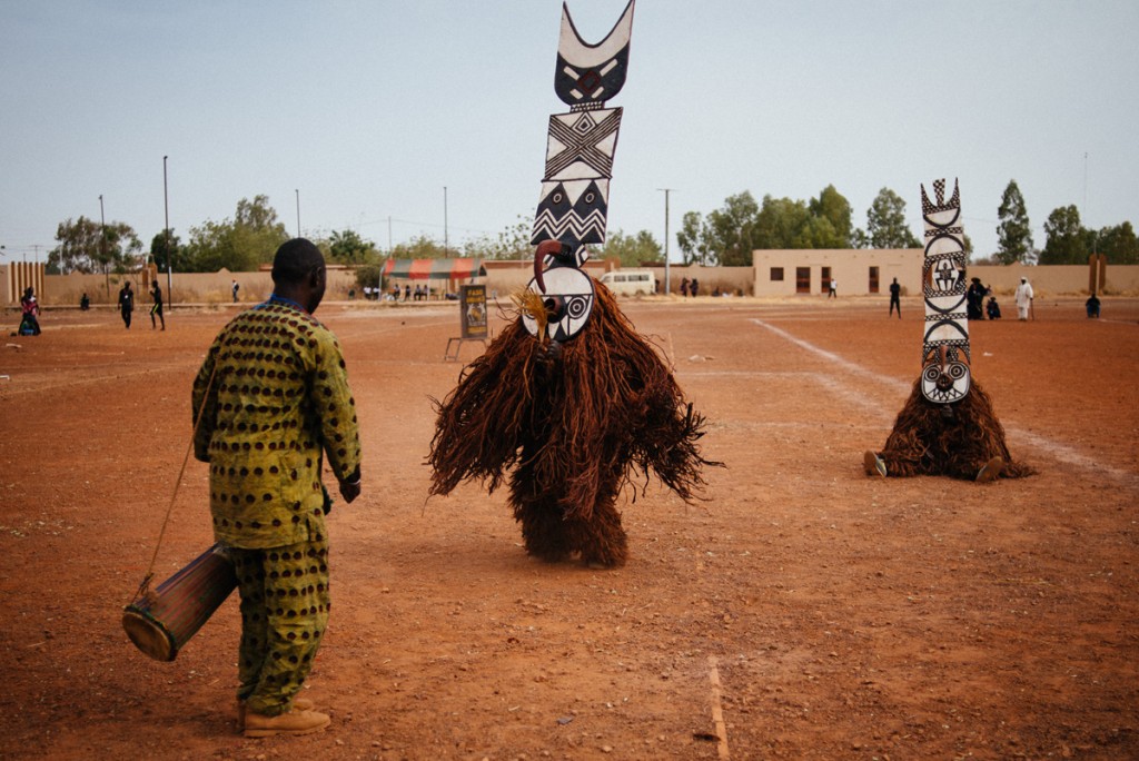 Fiber masks from Boni village (Burkina Faso) perform in the Regional Stadium of Dedougou. Music is essential, played with traditional African nstruments, accompanies very ritual and ceremony.